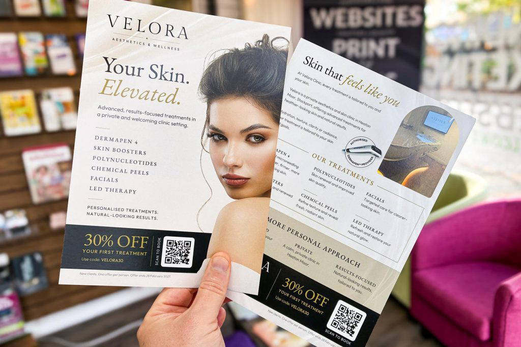 Printed A5 Velora Clinic promotional leaflet showing the finished double-sided design.